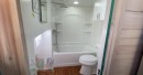 Custom tiny house is packed with functionality and surprise features