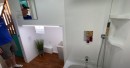 Custom tiny house is packed with functionality and surprise features