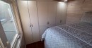 Custom tiny house is packed with functionality and surprise features