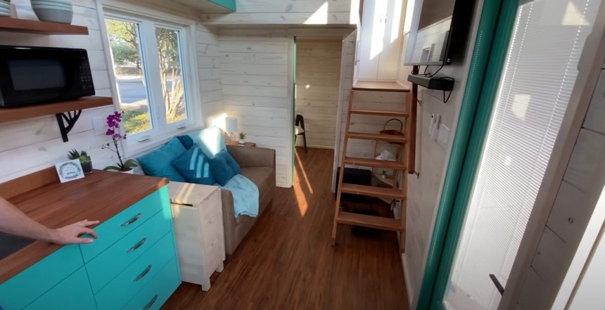 Custom tiny house is packed with functionality and surprise features