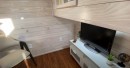 Custom tiny house is packed with functionality and surprise features