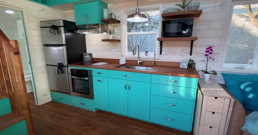 Custom tiny house is packed with functionality and surprise features