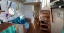 Custom tiny house is packed with functionality and surprise features