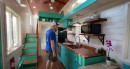 Custom tiny house is packed with functionality and surprise features