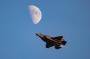 F-35A Lightning II flying under the Moon during air show