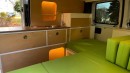 This Stealthy Micro Camper Van Mixes Style and Versatility Into a Roomy Living Space