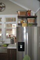 The Zircon tiny house boasts a fireplace on the porch and an XL kitchen