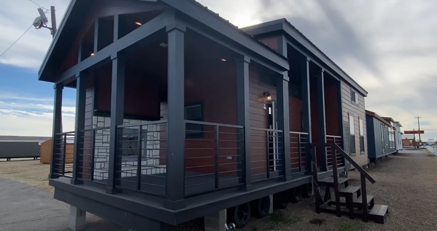 The Zircon tiny house boasts a fireplace on the porch and an XL kitchen